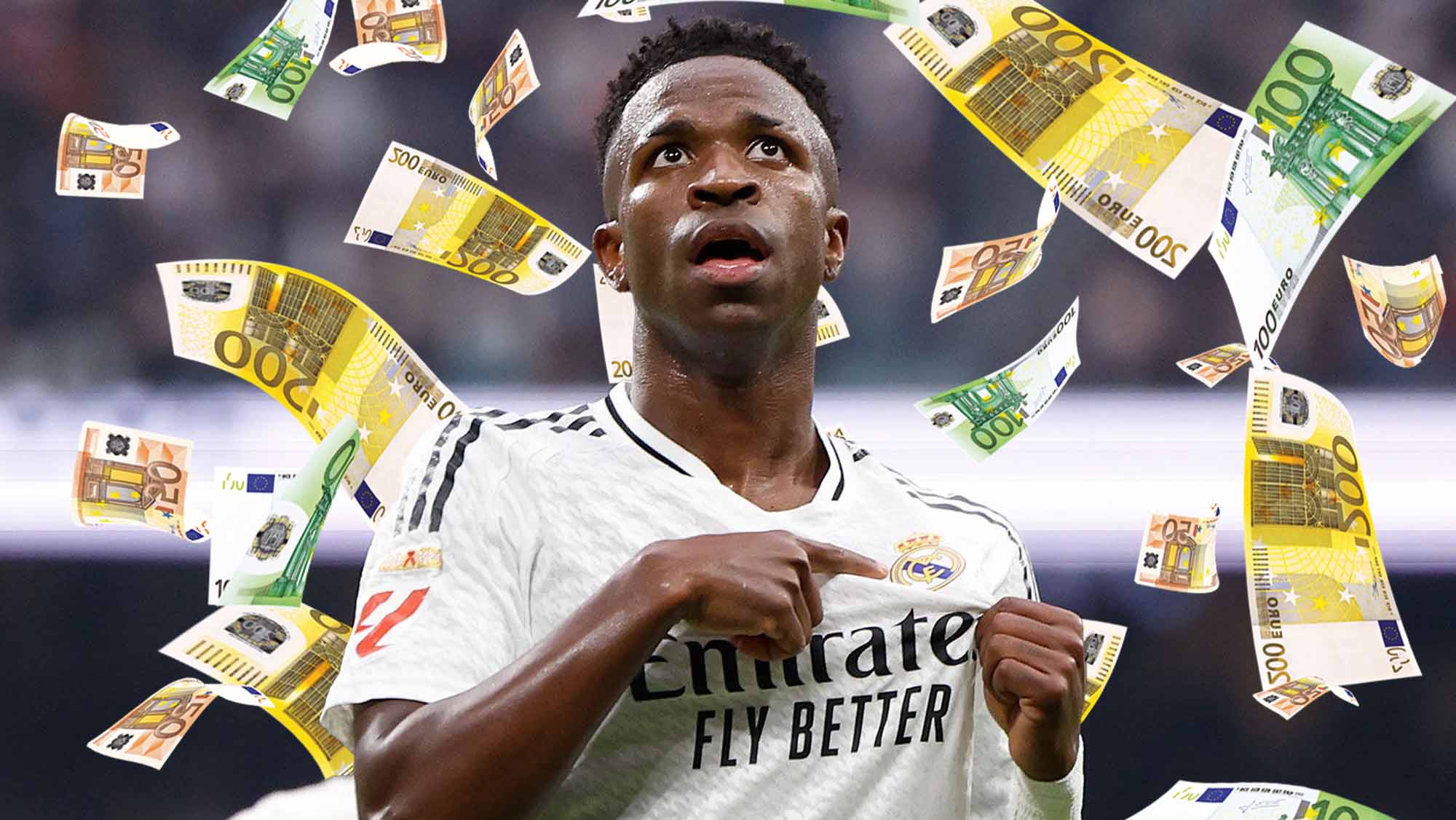 Vinicius señalándose el escudo y con lluvia de dinero
