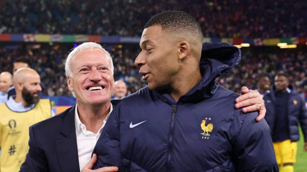 Mbappé y Deschamps