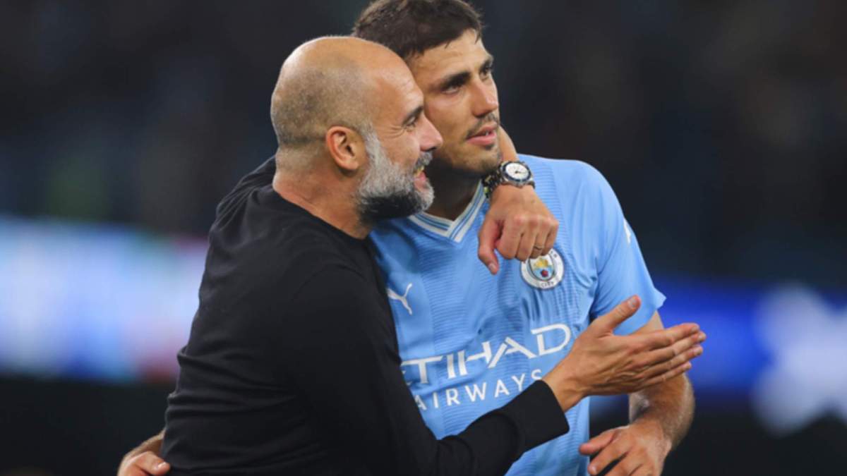 Pep Guardiola y Rodri Hernández, celebrando un título con el Manchester City.