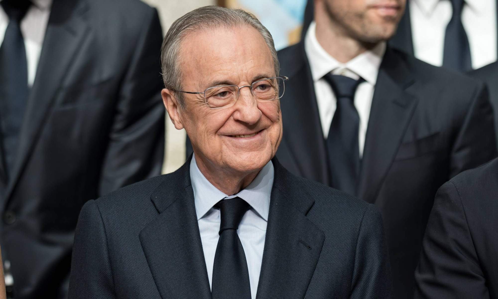 Florentino Pérez sonriendo en un acto.