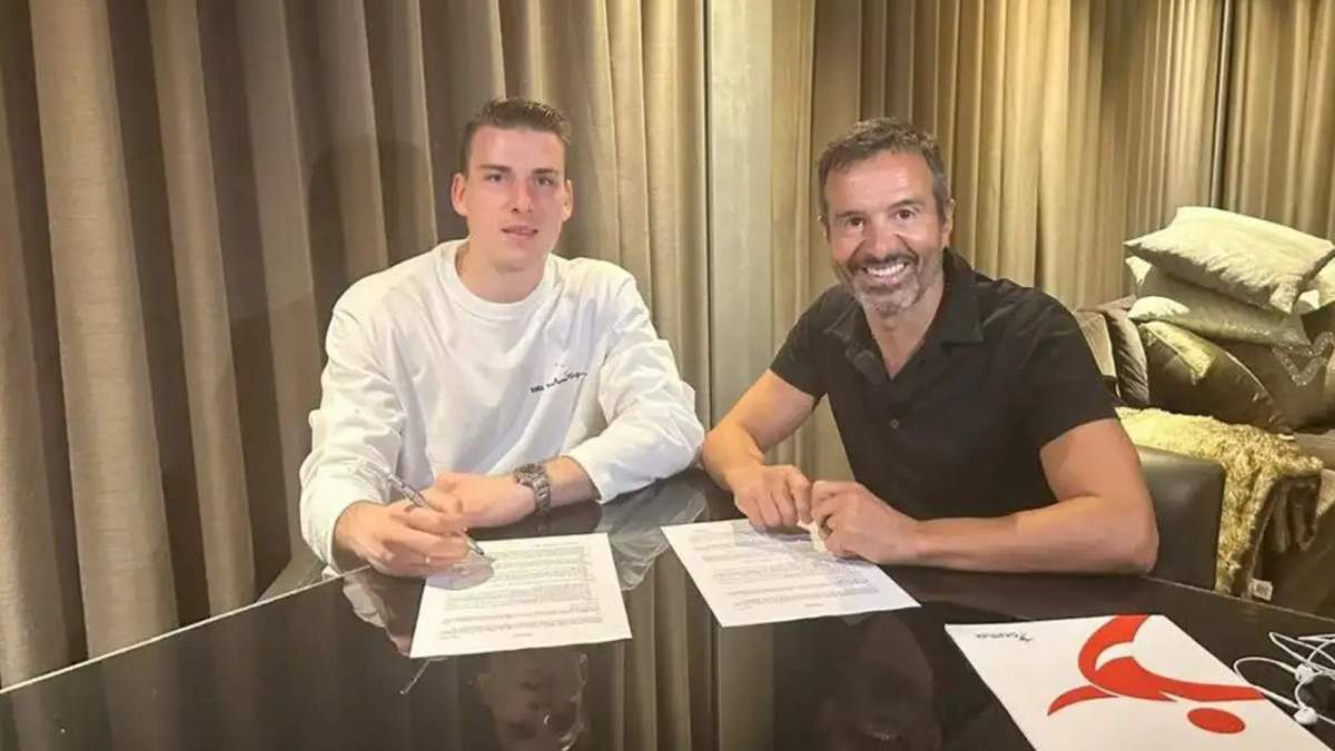 Andriy Lunin con su representante, Jorge Mendes.