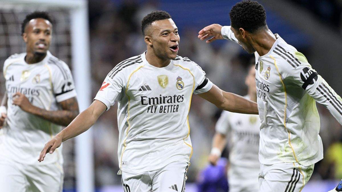 Mbappé celebrando con Bellingham y Militao