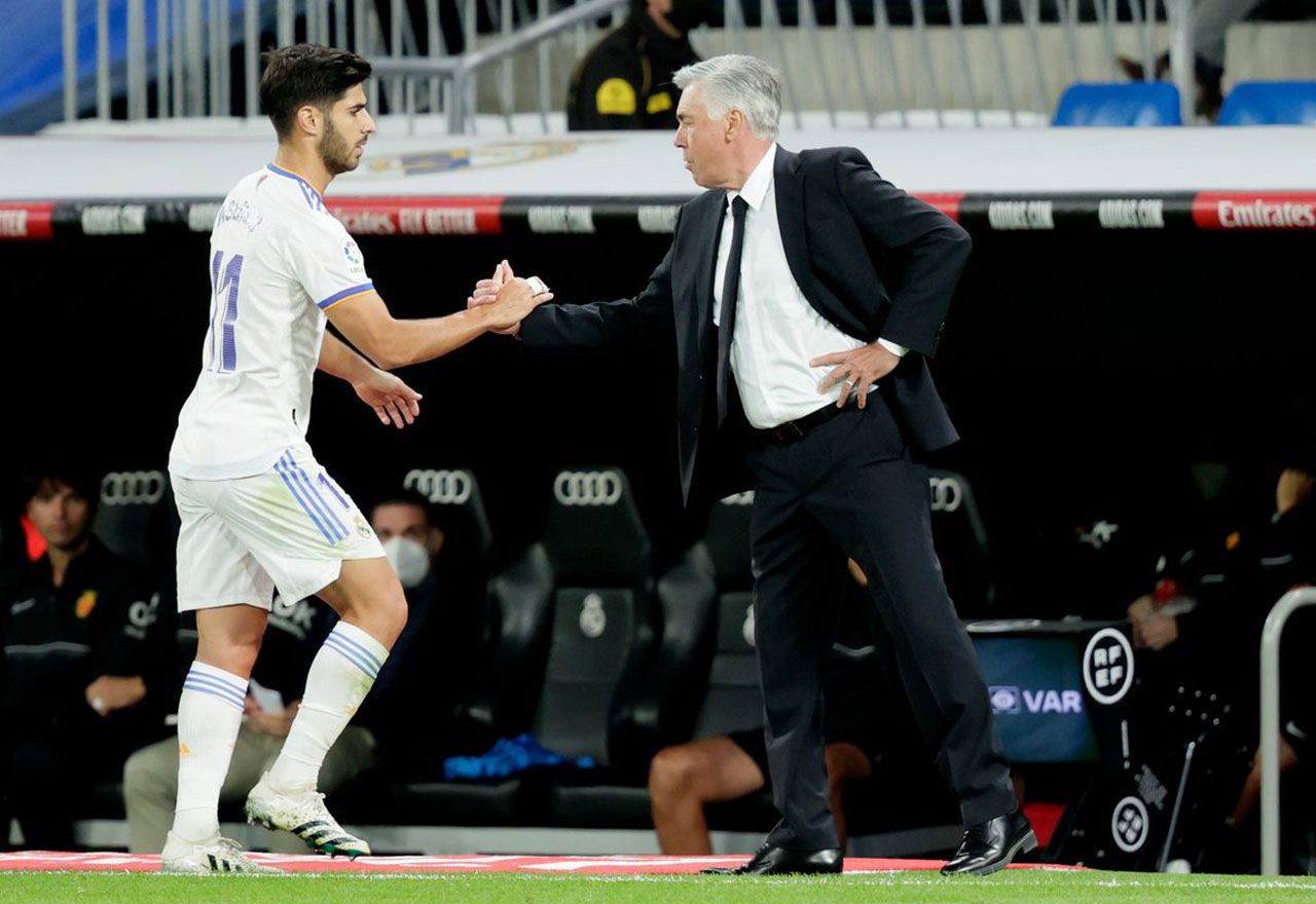 Ancelotti y Marco Asensio, en un partido de Liga
